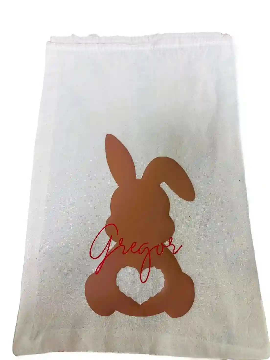 Oster-Baumwollsackerl mit hellbraunem Hasen und roter Schrift